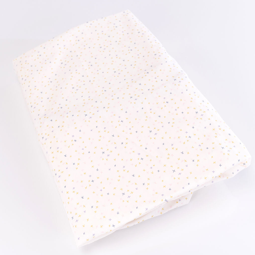 Little Tiny Hugs - Fitted Crib Sheet - Multi-colored Freehand X's on Ivory - Olli+Lime